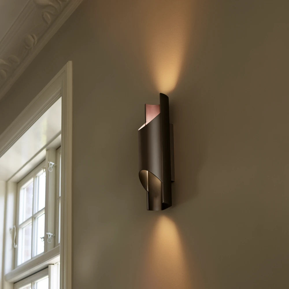 Aplique de pared de diseño danés con luz cálida